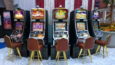 Live casino studio with multiple tables and croupiers